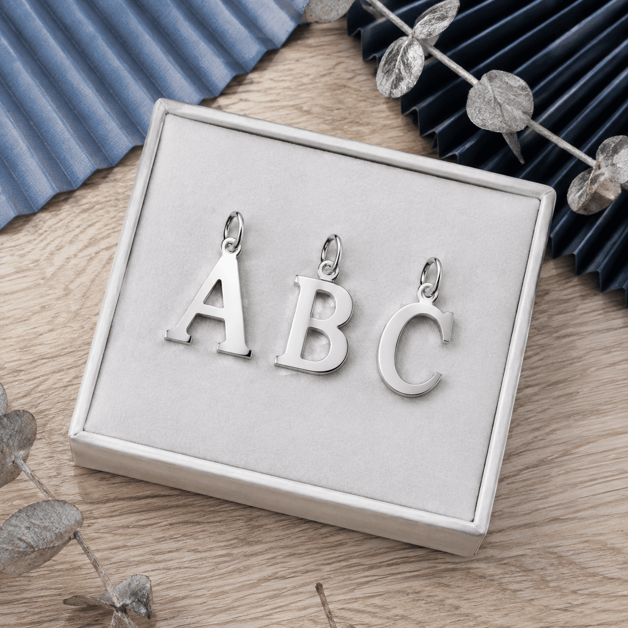 How to Source wholesale stainless steel letter charms with OEM Options - Blog Header Image